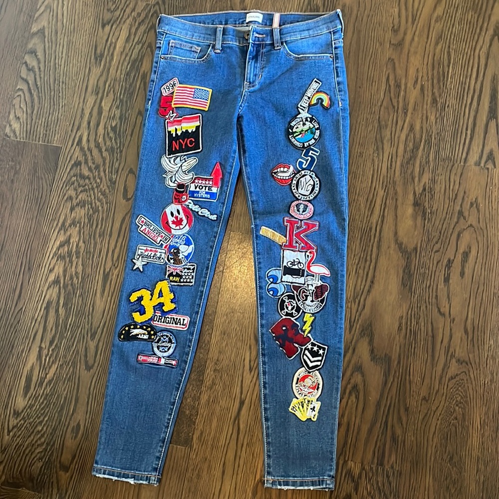 Sneak peek patched jeans. Never worn.